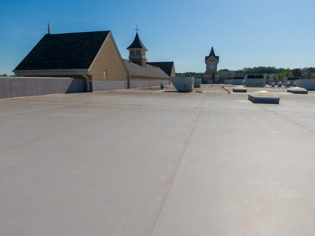 Drone Images of TPO Flat Commercial Roof With Metal Panels: New & Existing Construction