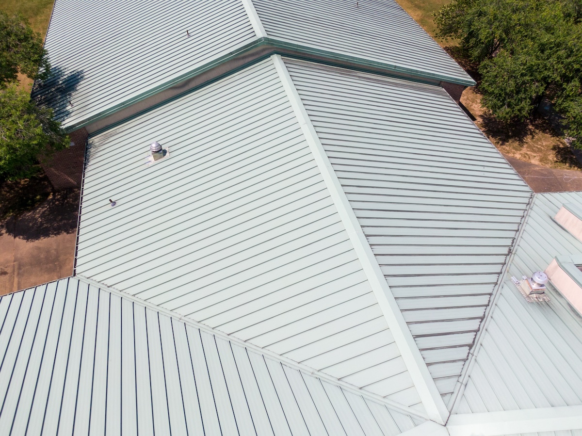 Daytime Drone Images of a Commercial Standing Seam Metal Roof on an Elementary School.