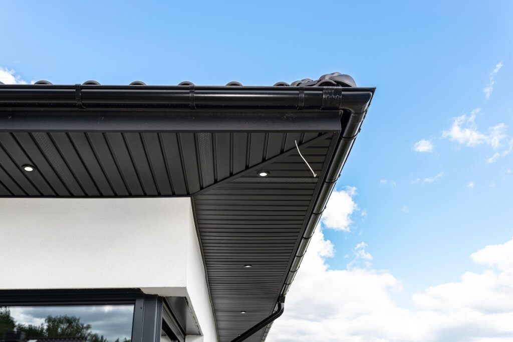black metal soffit under roof eaves