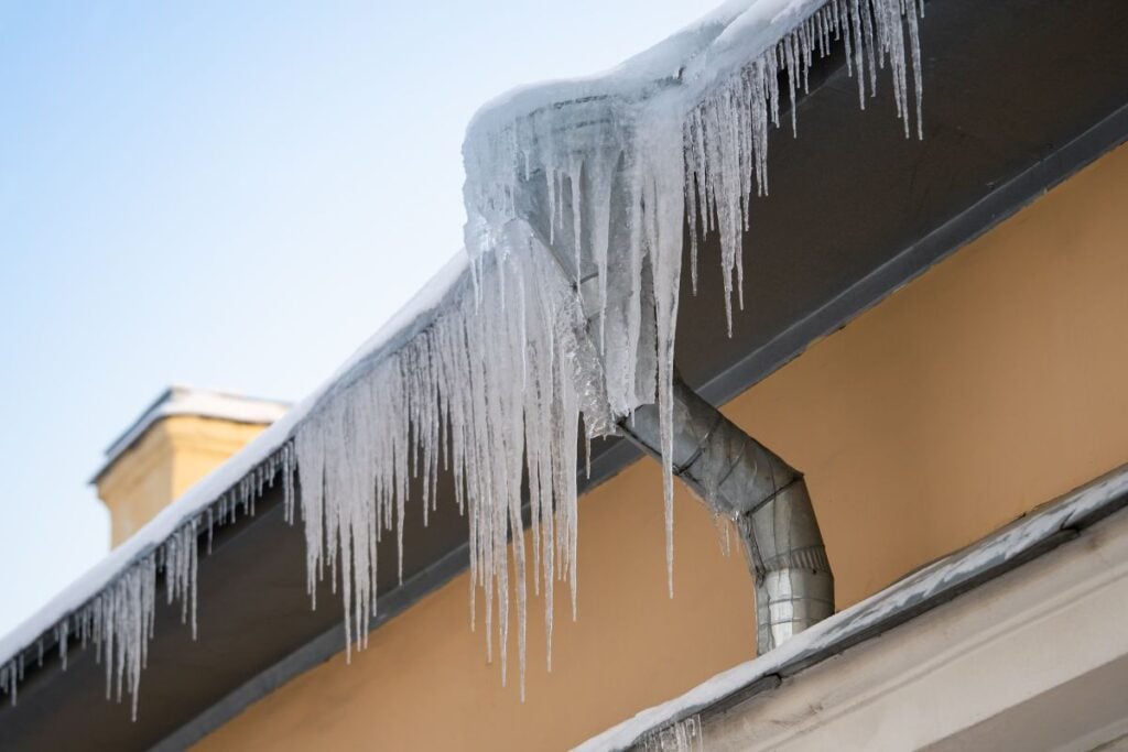 how to prevent ice dams orange house snow on roof