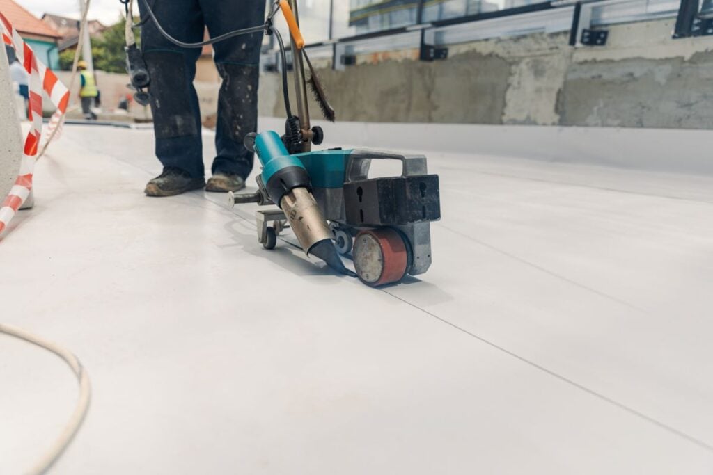 roofer installing TPO roof